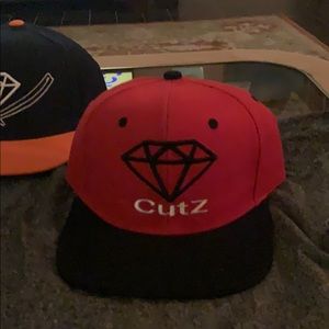 Red and Black Diamond CutZ Hat in new condition